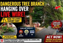 ವಿದ್ಯುತ್ ತಂತಿಯ ಮೇಲೆ ನೇತಾಡುತ್ತಿರುವ ಅಪಾಯಕಾರಿ ಕೊಂಬೆ: ಅಧಿಕಾರಿಗಳ ನಿರ್ಲಕ್ಷ್ಯಕ್ಕೆ ಸಾರ್ವಜನಿಕರ ಆಕ್ರೋಶ